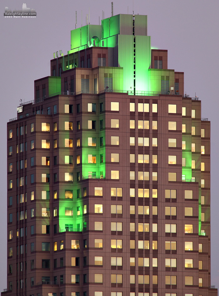 Two Hannover Square is illuminated green for the Holidays. 