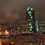 Downtown Raleigh seems to hover over the vast construction site for the new Convention Center. 