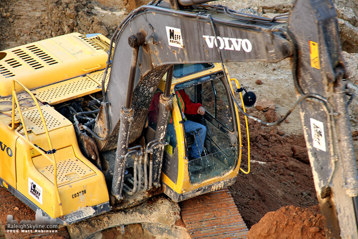 Construction worker in a backhoe.