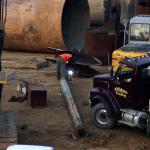 A construction worker welds at the site of the Raleigh convention center.