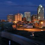 A CSX train creeps past Downtown Raleigh.