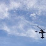 Apache Helicopter approaches Fayetteville Street. 