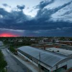 The sun eminates through the cloud base of storms on April 3 west of downtown Raleigh.