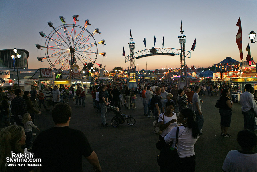 Dusk falls on NC State Fair goers.