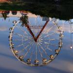 The reflection of the Ferris Wheel.