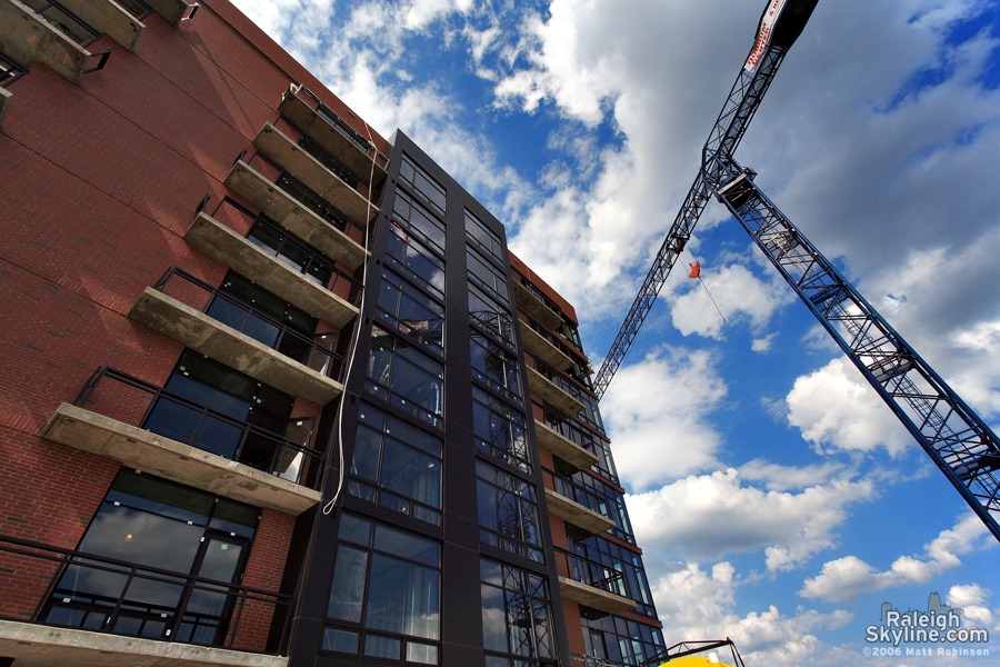 Looking up at the south facing side of the Quorum Center from the common area.