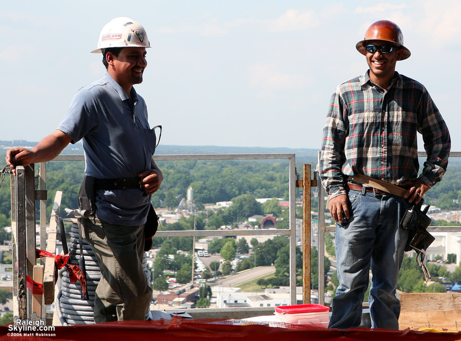 Construction workers at the Quorum Center.