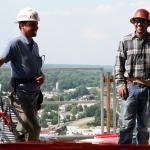 Construction workers at the Quorum Center.