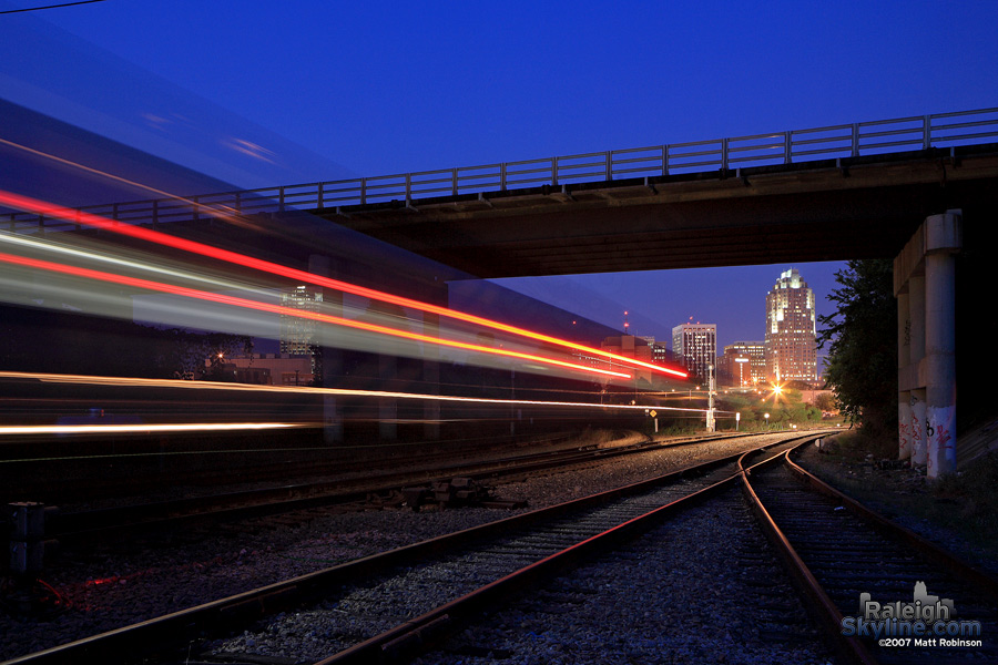 Amtrak streaks under the Boylan Avenue Bridge.