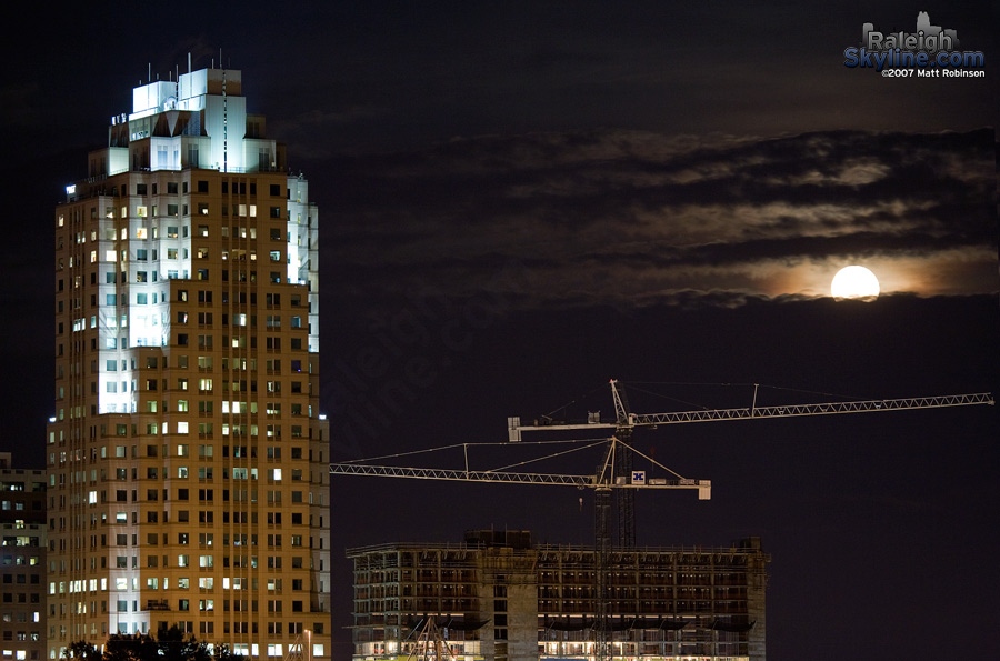 The moon sits over the new Marriott.