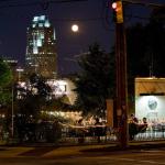 The full moon over the Moonlight Pizza Company, downtown Raleigh.