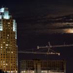 The moon sits over the new Marriott.