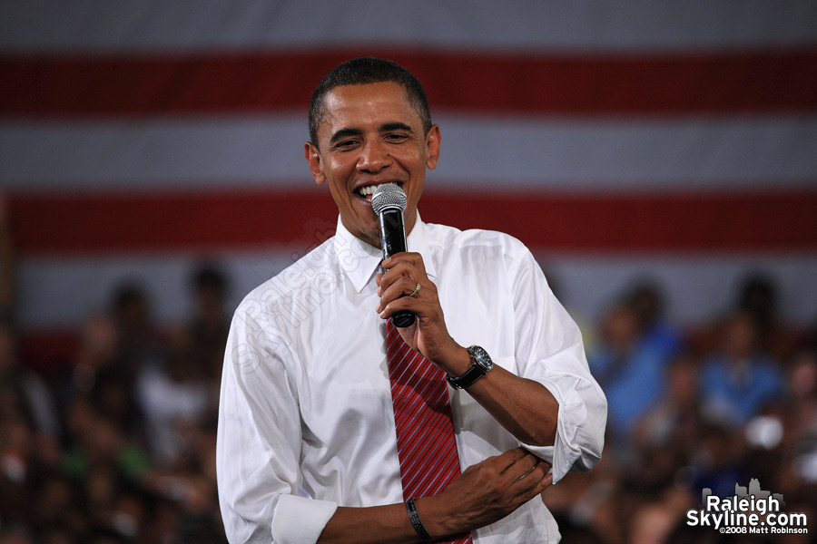 Barack Obama rolls up his sleeves.