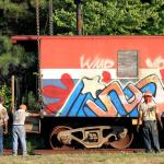 The mysterious cabooses along Capital Boulevard in Raleigh are placed onto rail.