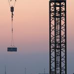 Empire Properties L Building tower crane at sunset