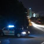 Raleigh Police Car diverts cars away from scene of the fire.