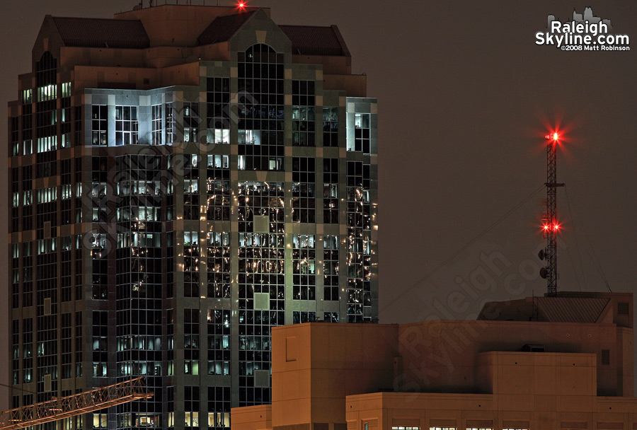 RBC Plaza construction lights reflect off of Wachovia.