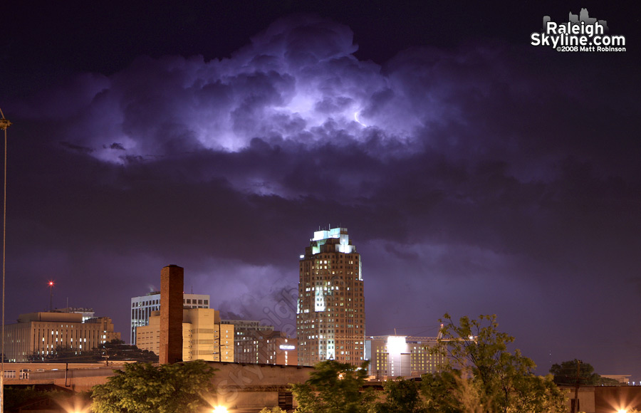 Lightning illuminates a storm behind BB&amp;T from Hillsborough street