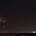 Lightning jumps from a storm to the ground