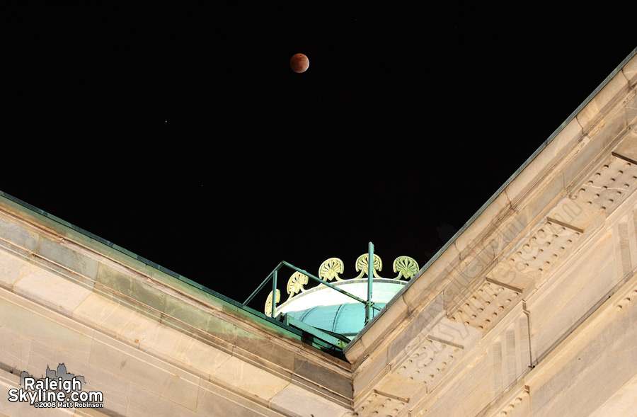 North Carolina State Capitol building dome and the moon (its a stretch).