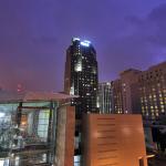 Lightning brightens the sky near the convention center.