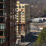 West at North condos receives a brick cladding.