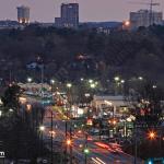 Wake Forest Road and the growing Glenwood South skyline.