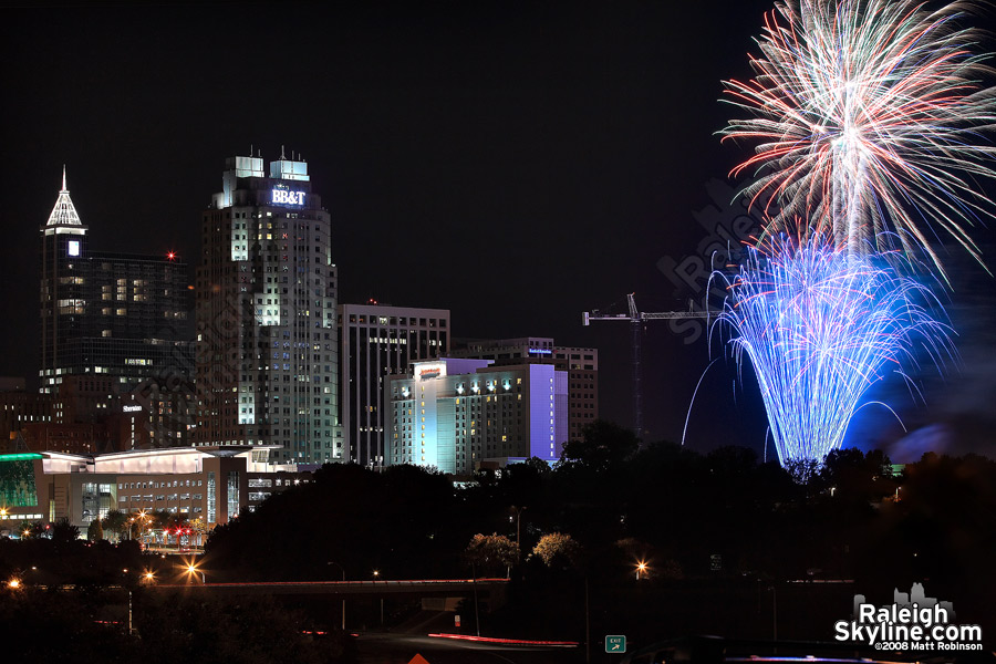 Red and Blue fireworks over the city of Raleigh.