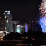 Red and Blue fireworks over the city of Raleigh.