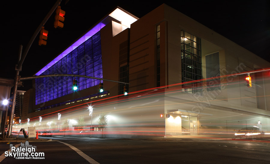 Traffic streams by the new convention center.