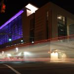 Traffic streams by the new convention center.