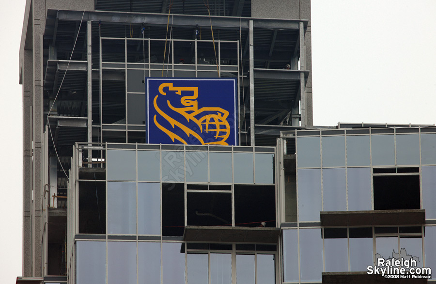 Royal Bank of Canada logo being put into place atop RBC Plaza