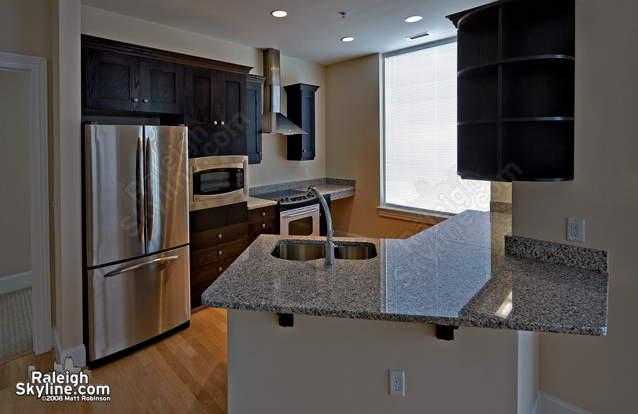 A kitchen inside a residential unit in the West at North.