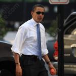 Barack Obama heads into the downtown Raleigh Sheraton