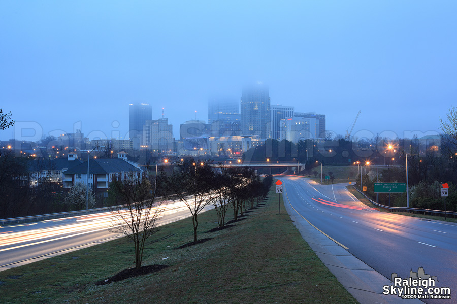 Fog begins to consume downtown Raleigh.