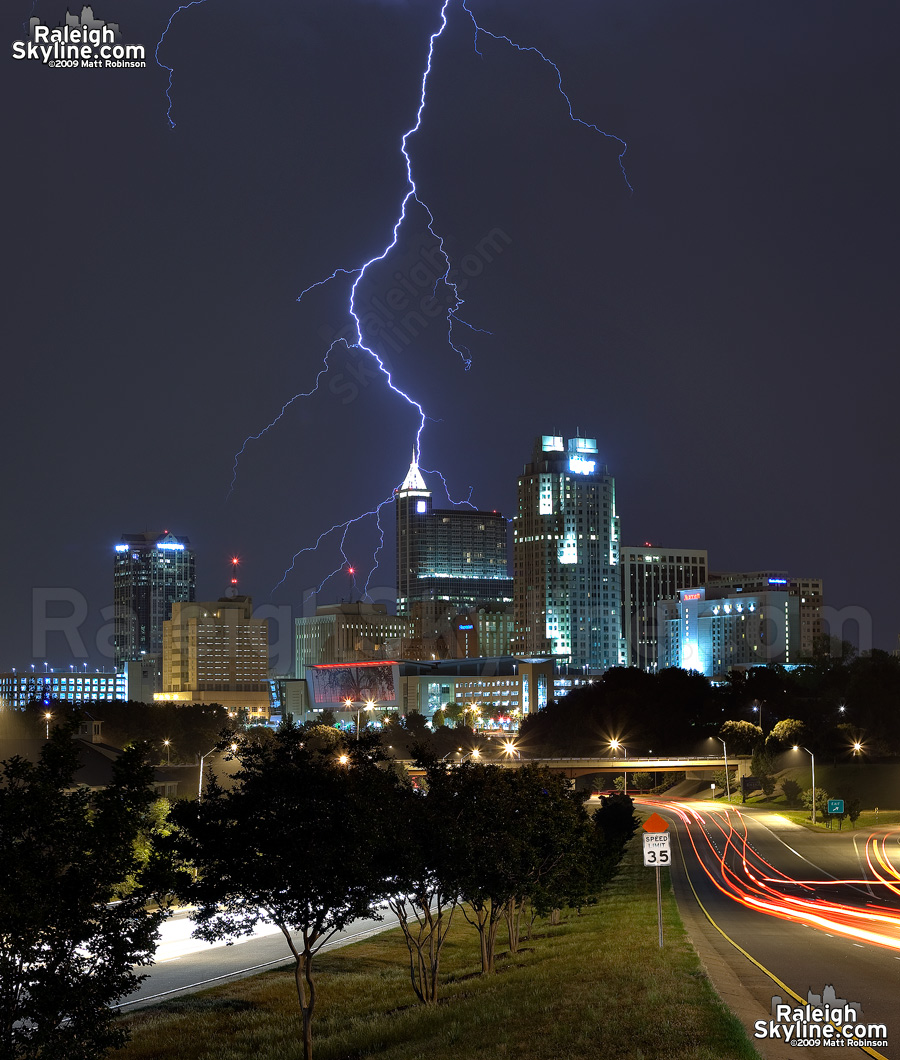 Lightning strikes behind the cityscape of downtown Raleigh