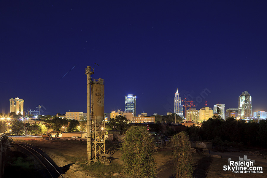 The International Space Station streaks across the sky above downtown