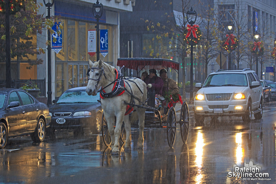 Horse Carriage in the early December snow on Fayetteville Street