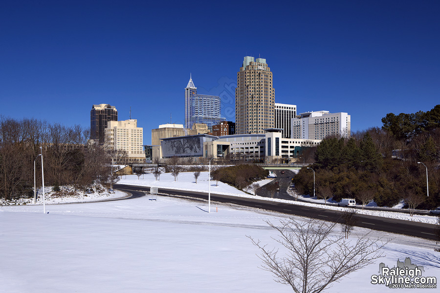 Blue sky with snow and skyline