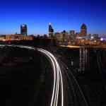 Amtrak streams under the Boylan Avenue Bridge in the predawn hours in Raleigh