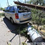 Transformer and utility poll down on a van along Maywood Avenue