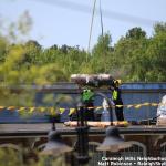 Workers atop Caraleigh Mills Condos