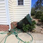 Overturned Raleigh Trash container