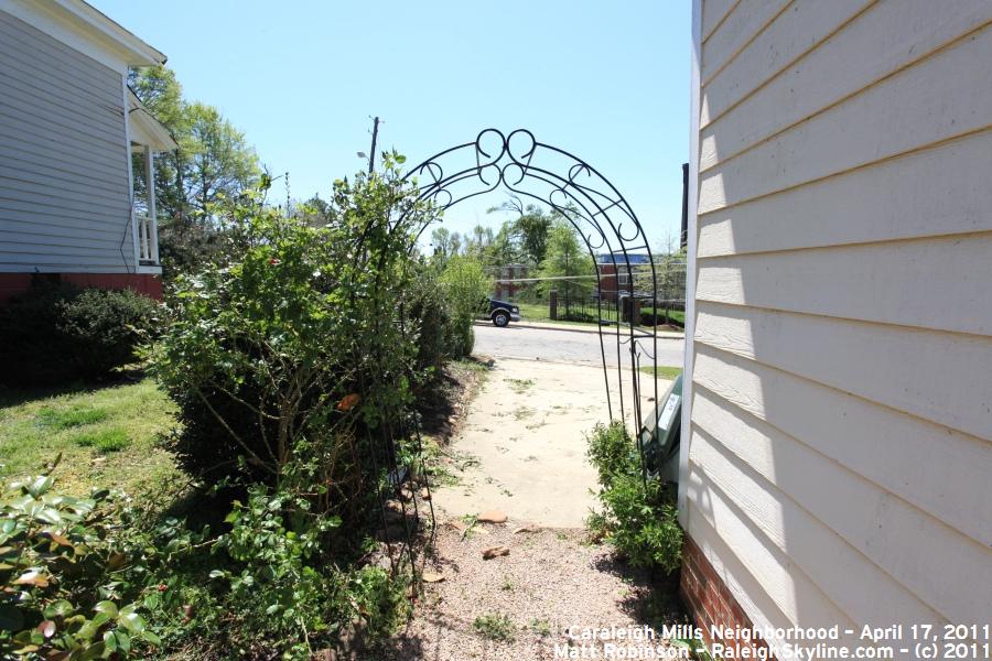 Bent metal arch