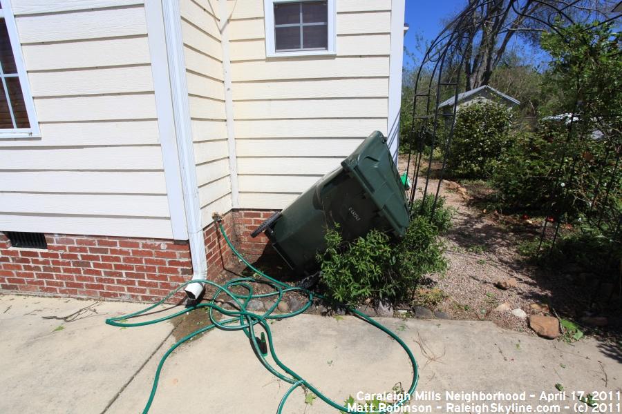 Overturned Raleigh Trash container