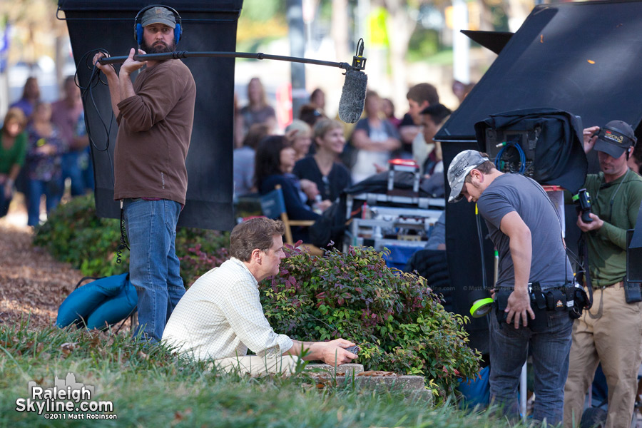 Colin Firth and crew filming in Nash Square, Raleigh