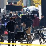 Arthur Newman, Golf Pro filming on Fayetteville Street in Raleigh