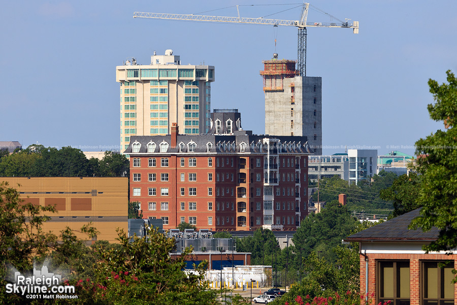 SECU elevator shafts rise to the height of the Clarion Hotel