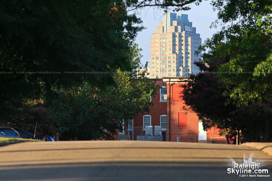 Two Hannover Square peeks over Dorothea Dix State Hospital