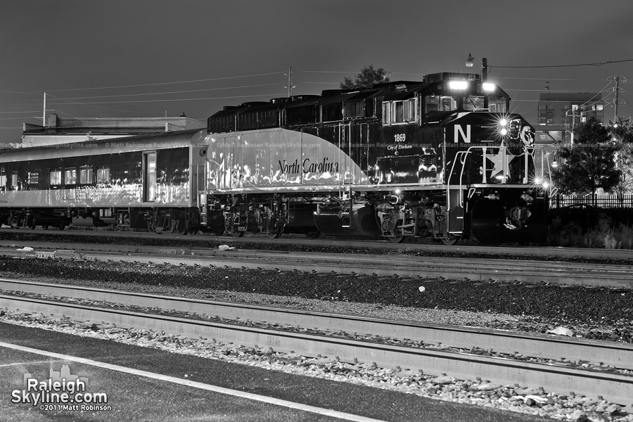 NCDOT City of Durham locomotive sits at City of Raleigh Amtrak Station